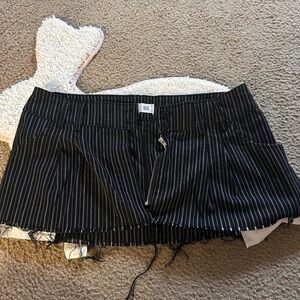 Black Pinstripe Mini Skirt From Urban Outfitters (BDG) never worn.